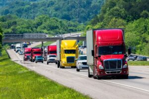 Trucks in convoy on interstate highway