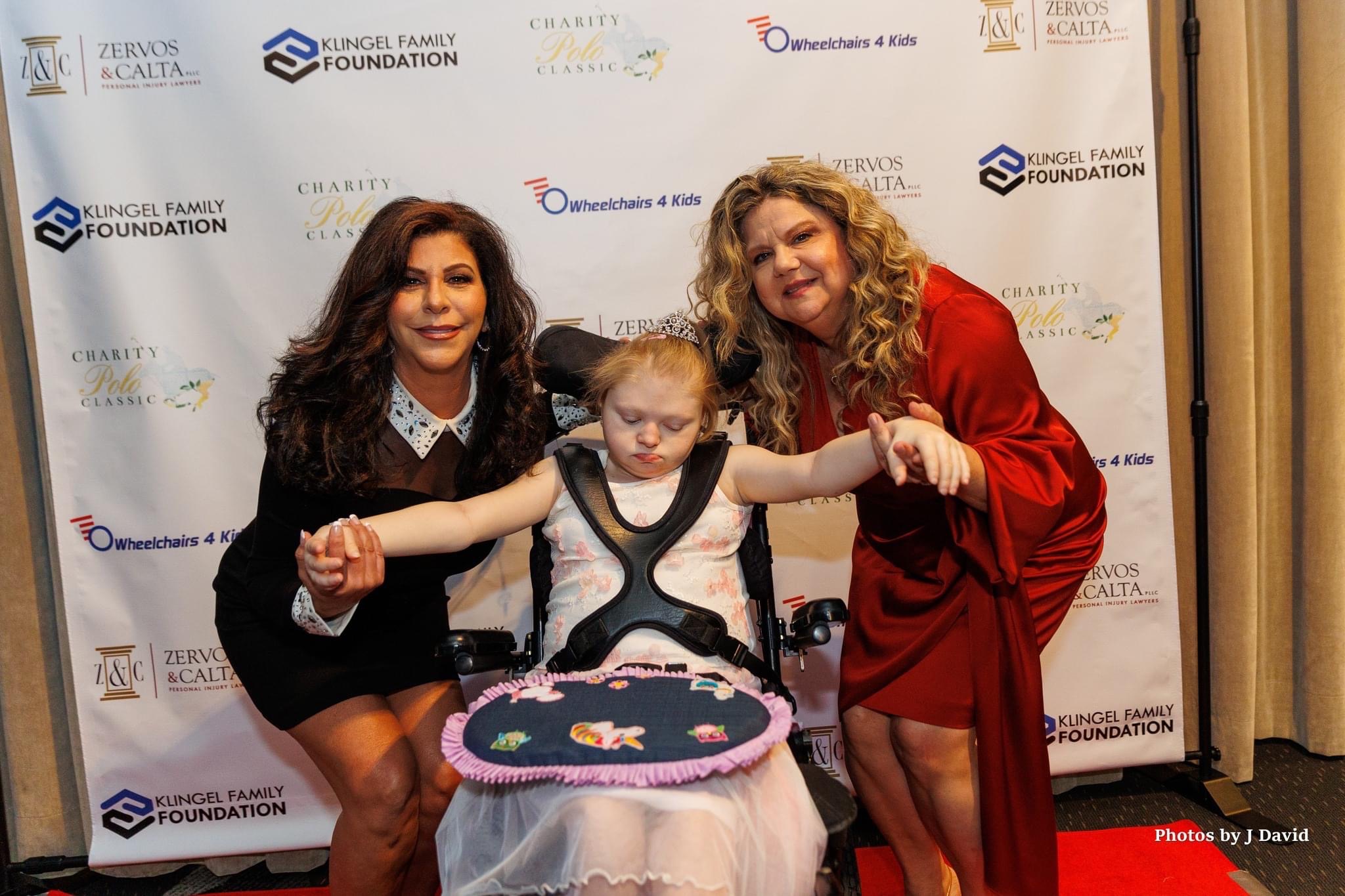 Angela Zervos and Lauren Calta at Wheelchairs 4 Kids Silent Auction