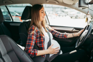 Pregnant driver going for pre-natal check up.