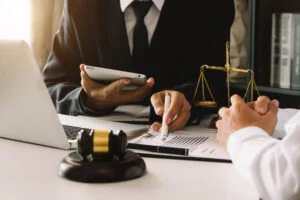 Lawyer explaining to client the legal fees.